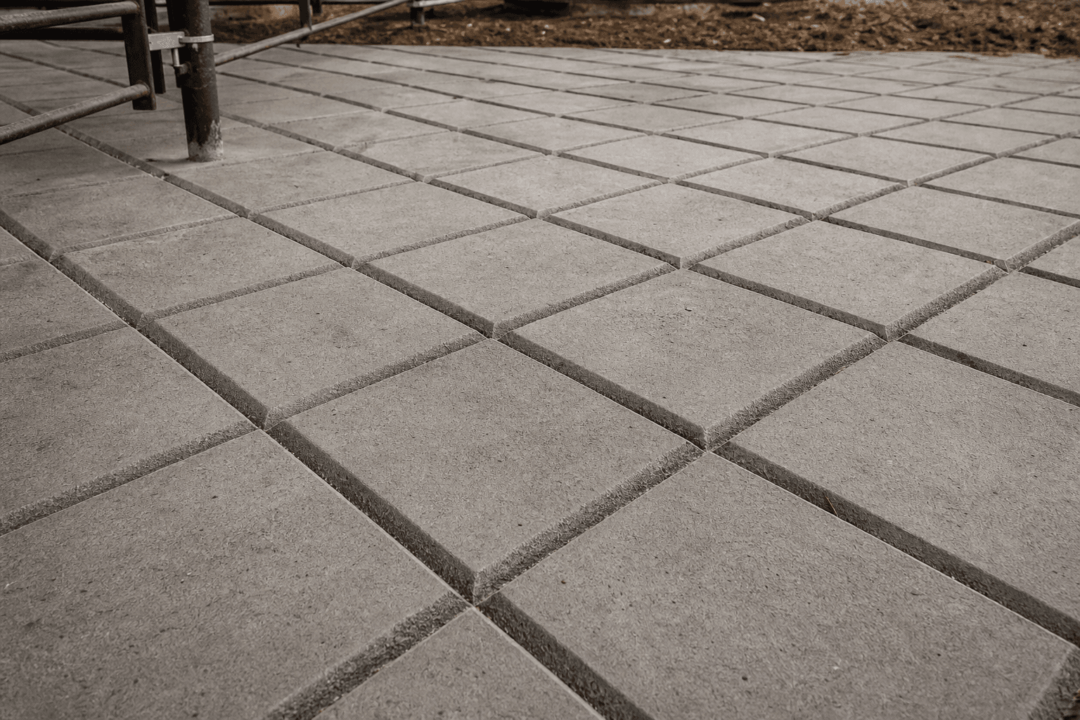 Close-up of diamond pattern concrete grooving for turn areas
